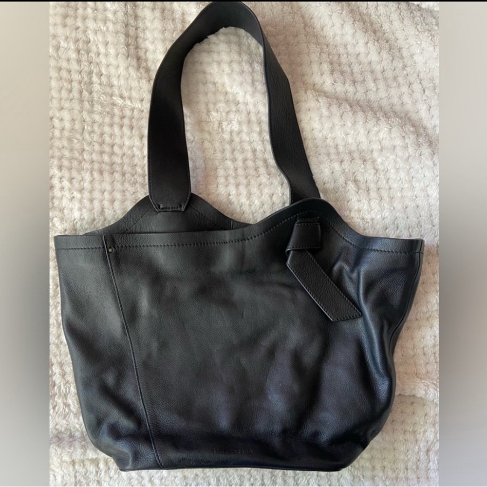 Lucky Brand knot hobo style bag, USED 
This item is cross posted it has sold.
